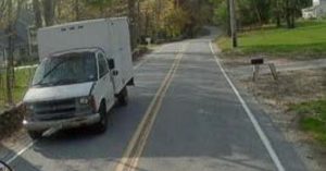 Box truck flees after hiting school bus in Pelham