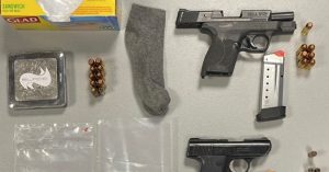Dorchester man arrested on firearm, drug charges after search warrant