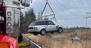 Mysterious abandoned vehicle recovered from marsh in Holbrook