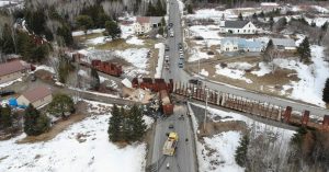 Tractor trailer collides with train in Masardis, derails it