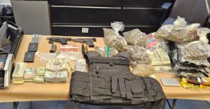 Boston police seize drugs, guns in Dorchester raid