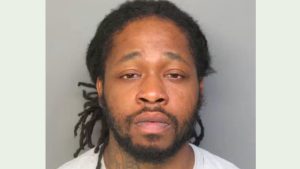 Warrant issued for homicide suspect in Troy